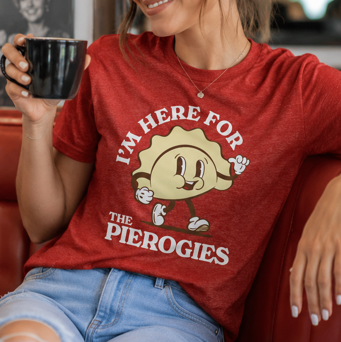 Female model wearing the red Here for the Pierogies SMVT Exclusive graphic tee.