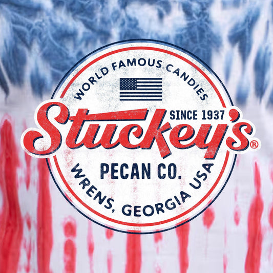 Close-up of the distressed Stuckey's® Pecan Co. graphic with patriotic red, white, and blue accents on the Made in the USA Tie-Dye Tee.