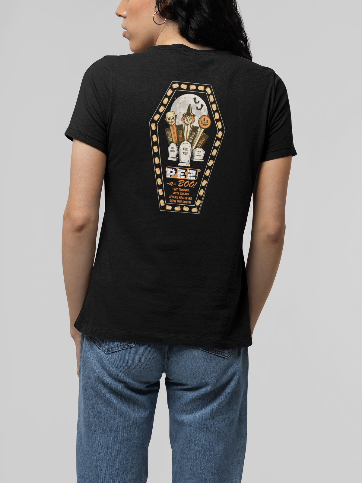 Woman wearing PEZ®-a-Boo! vintage Halloween graphic T-shirt featuring retro PEZ® candy artwork