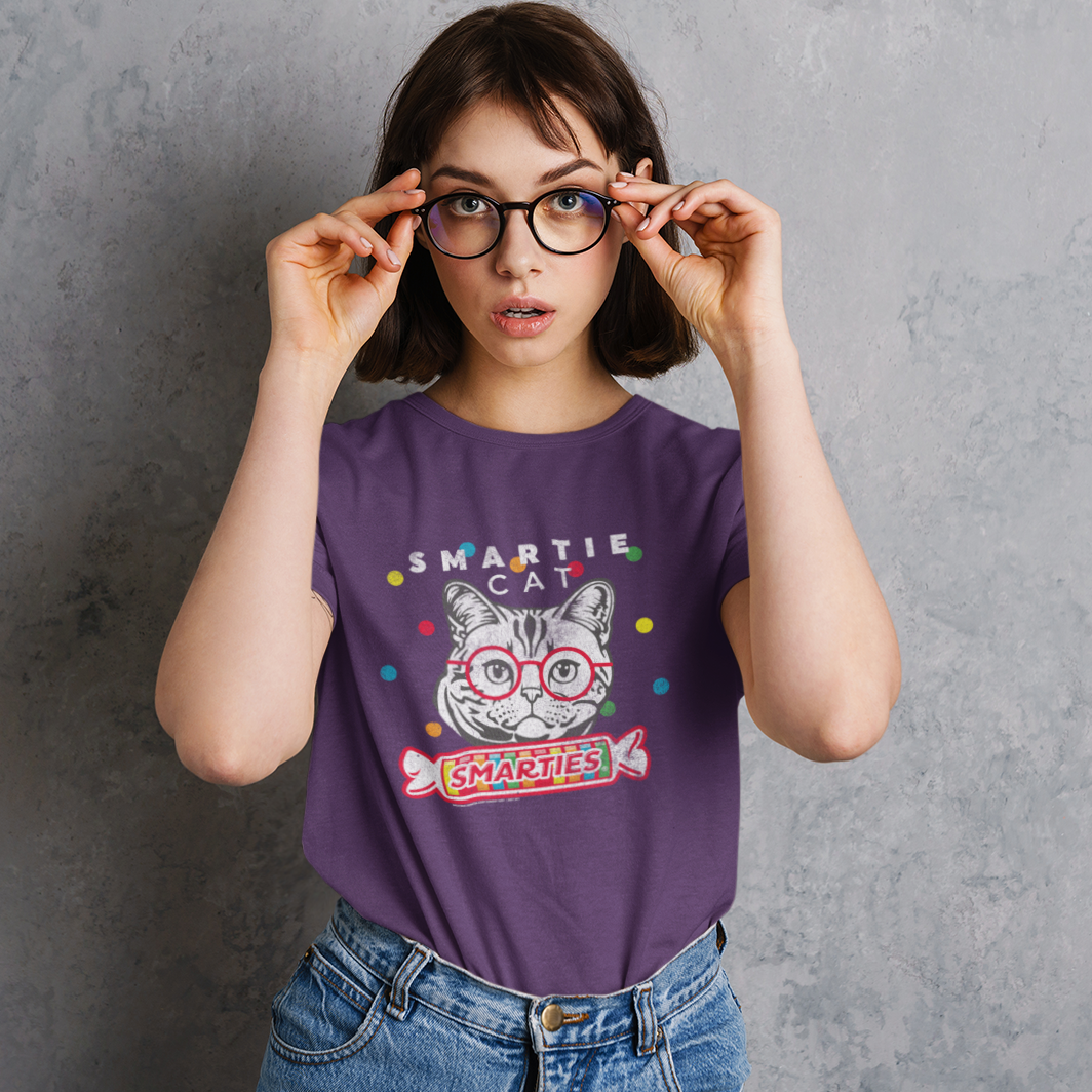 Woman with glasses wearing the Smartie Cat heather purple unisex graphic t-shirt