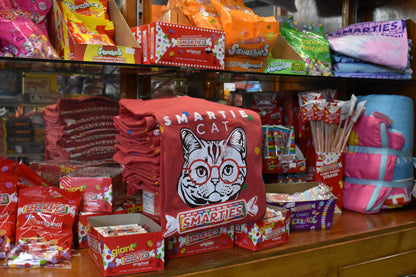 soft cotton fabric detail featuring smartie cat novelty graphic print