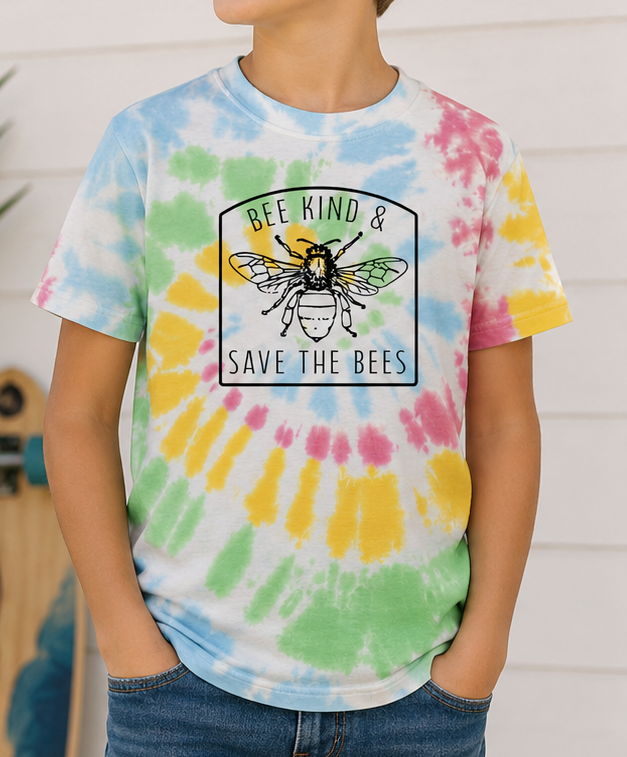 Child wearing the Bee Kind & Save the Bees Unisex Youth Tie-Dye Tee featuring a colorful bee graphic on a rainbow spiral tie-dye shirt.