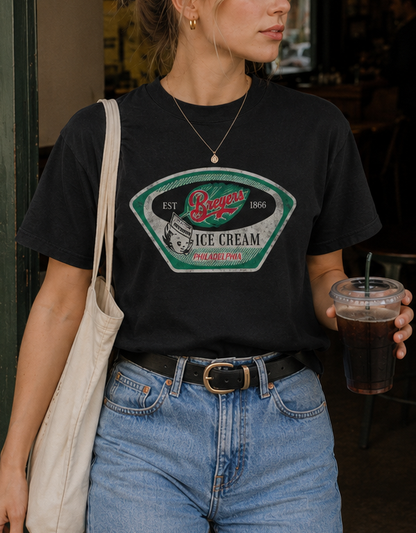 Woman wearing a Breyers Ice Cream Novelty Tee in a casual lifestyle setting featuring vintage Philadelphia ice cream artwork.