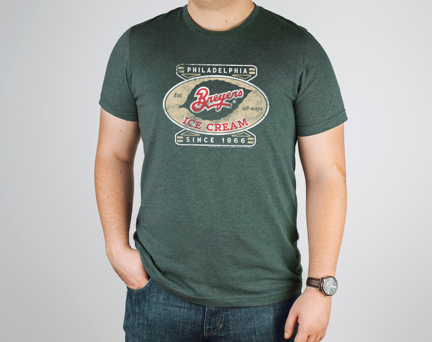 Man wearing a Breyers Ice Cream Philadelphia Since 1866 Vintage Unisex Tee showcasing classic ice cream branding and vintage-inspired artwork.