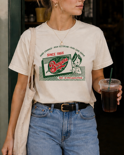 Woman wearing a Breyers Ice Cream Vintage 1950s Advertisement Unisex Tee featuring nostalgic retro ice cream advertising artwork.