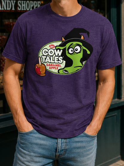 Male model wearing the purple Goetze's Cow Tales Caramel Apple Halloween Duke graphic T-shirt for fall.