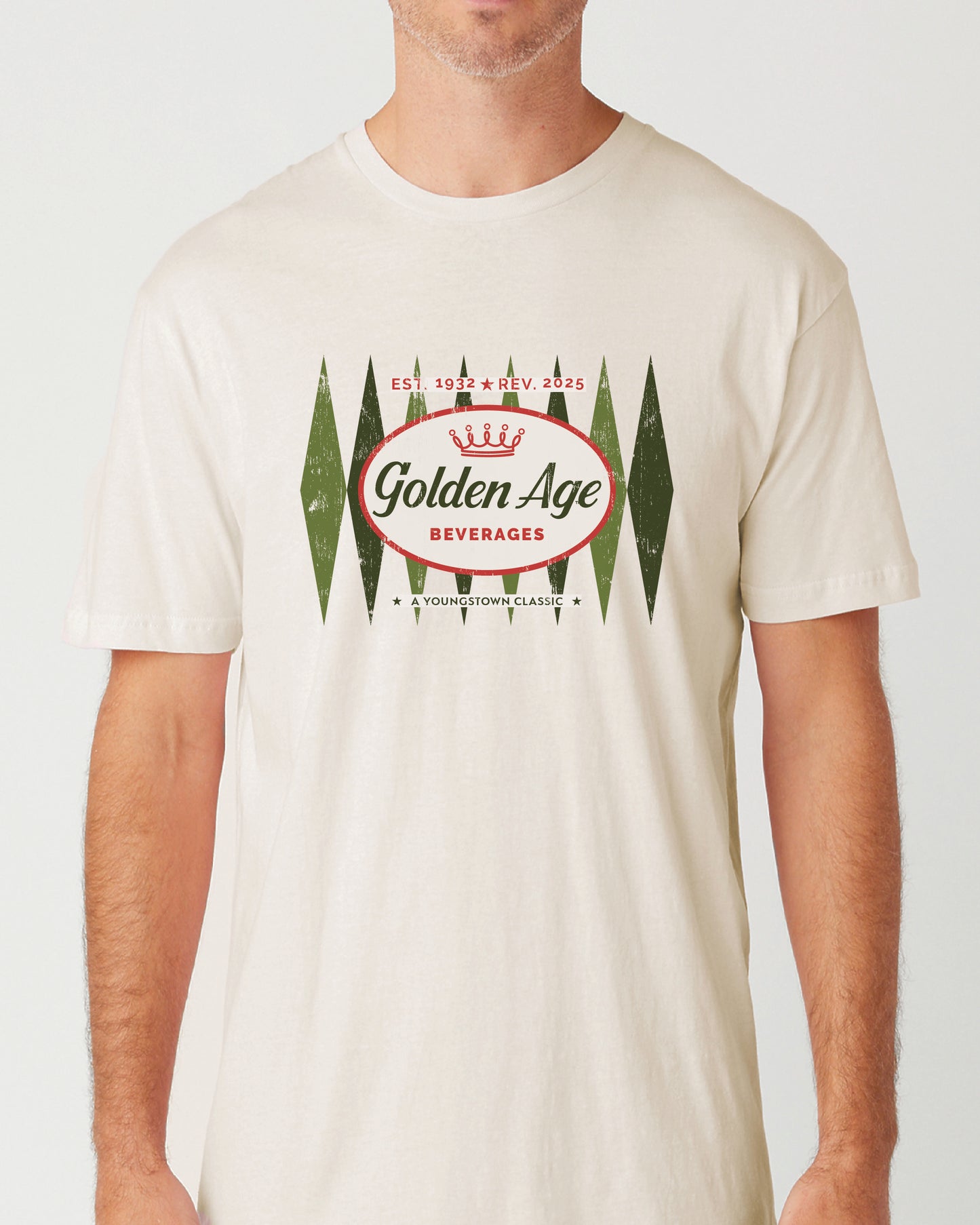 Male model wearing the Golden Age Retro Logo Tee vintage soda unisex graphic T-shirt with classic retro logo design.