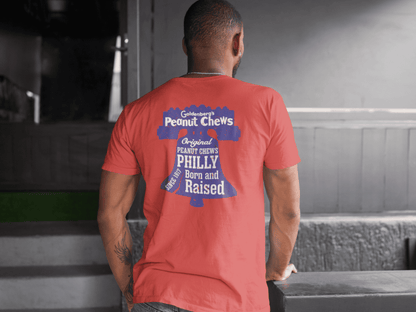 Male model wearing the back of the GOLDENBERG'S® PEANUT CHEWS® Since 1917 Liberty Bell Tee featuring the large Philly Born and Raised graphic.