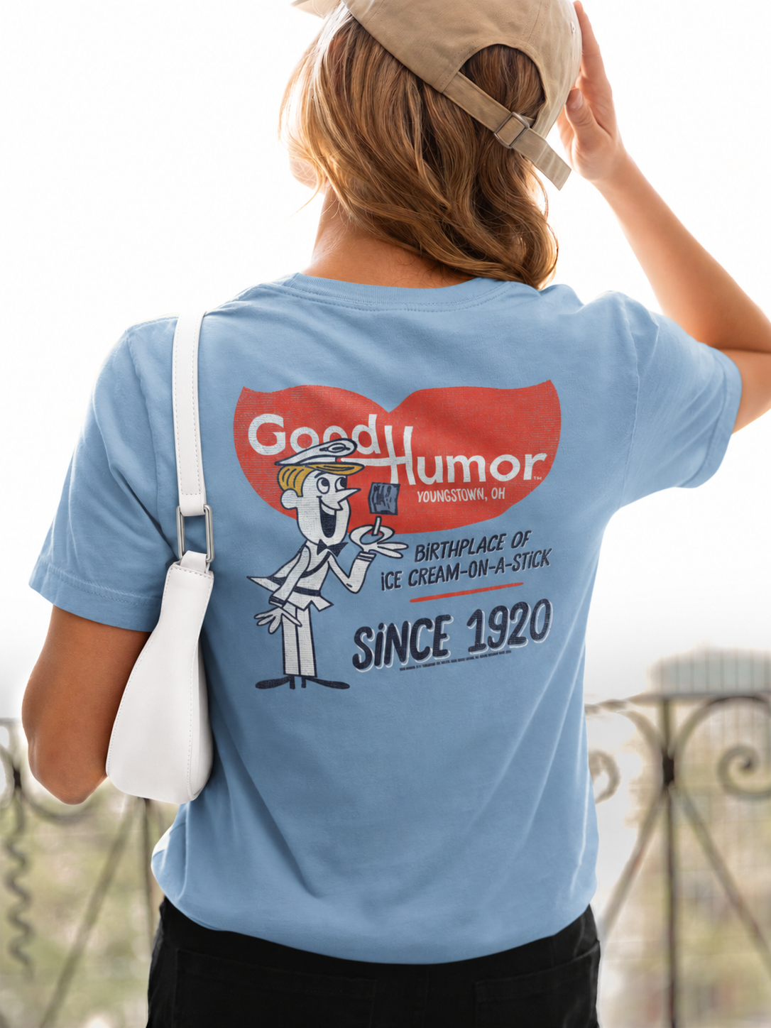 Woman wearing a Good Humor™ Retro Man Ice Cream Front & Back Tee featuring the iconic Good Humor character and nostalgic ice cream truck artwork.
