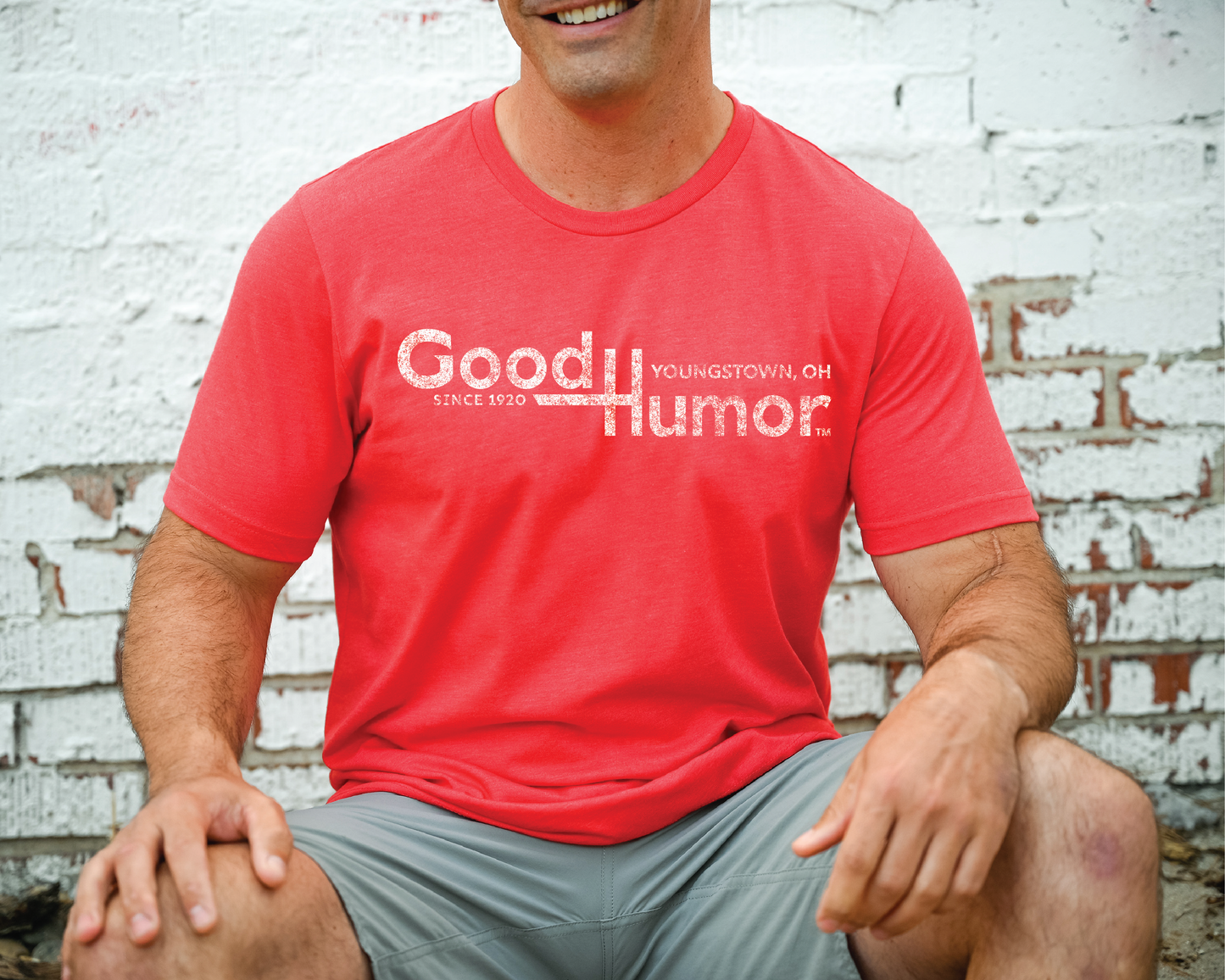 Man wearing a Good Humor™ Vintage Ice Cream Bar 1920 Tee showcasing a classic chocolate-covered ice cream bar graphic and vintage-inspired branding.