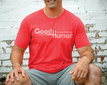 Man wearing a Good Humor™ Vintage Ice Cream Bar 1920 Tee showcasing a classic chocolate-covered ice cream bar graphic and vintage-inspired branding.