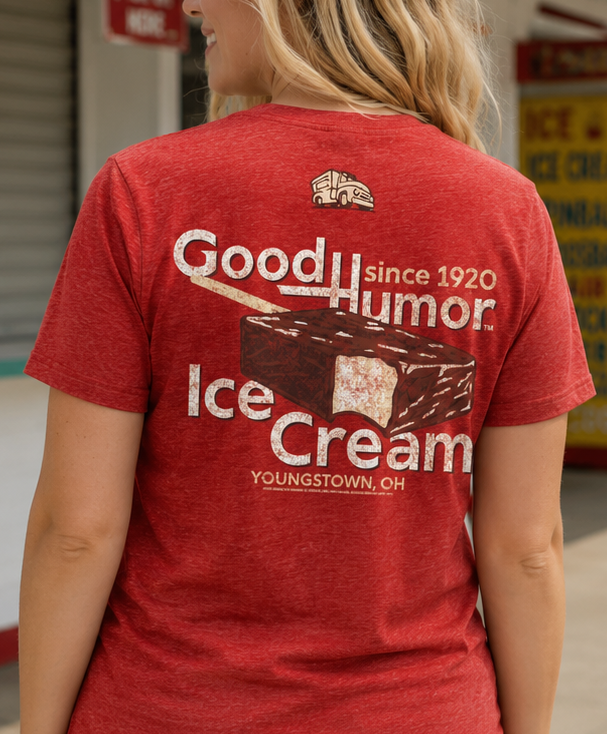 Woman wearing a Good Humor™ Vintage Ice Cream Bar 1920 Tee featuring nostalgic ice cream bar artwork and retro branding inspired by Youngstown, Ohio.