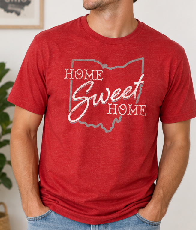 Man wearing the Home Sweet Home Ohio Pride unisex graphic T-shirt with a retro Ohio pride graphic.