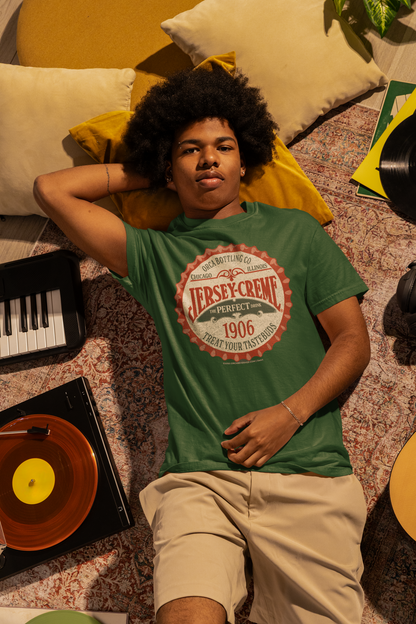 Man wearing the Jersey Creme® Bottle Cap Tee featuring the vintage 1906 bottle cap logo on an olive green unisex T-shirt.