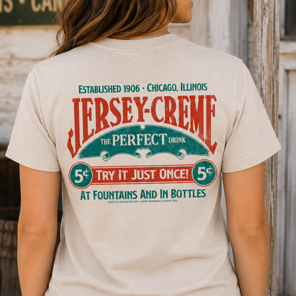 Female model wearing the Jersey Creme® The Perfect Drink Tee showcasing nostalgic Jersey Creme® artwork and classic beverage branding.