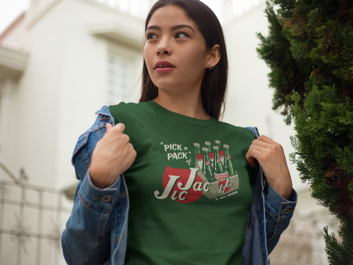 Female model wearing the Jic Jac® Pick A Pack! Tee with nostalgic soda graphics and classic retro style.