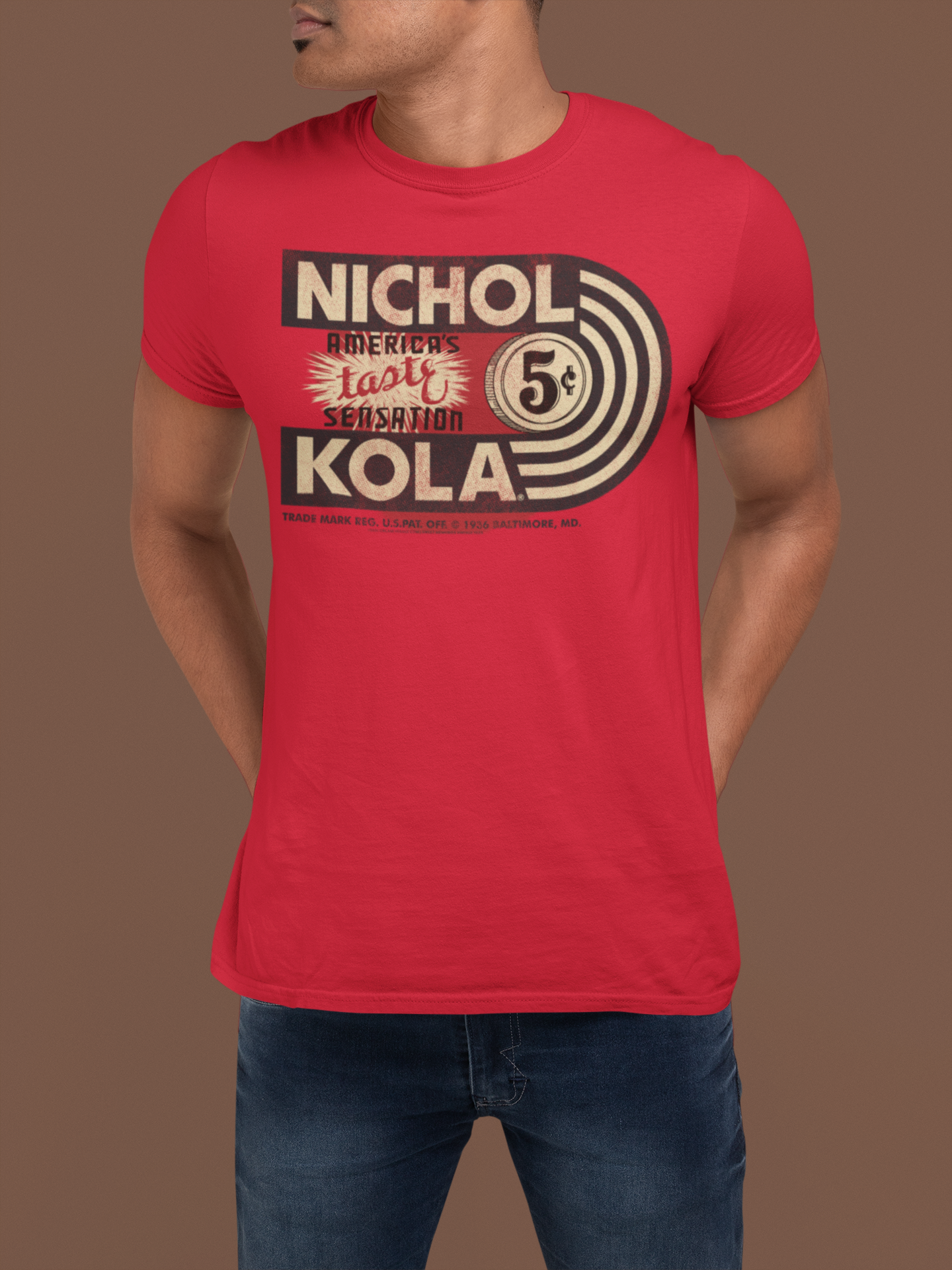 Male model wearing the Nichol Kola® America's Taste Sensation Tee featuring a classic vintage soda graphic.
