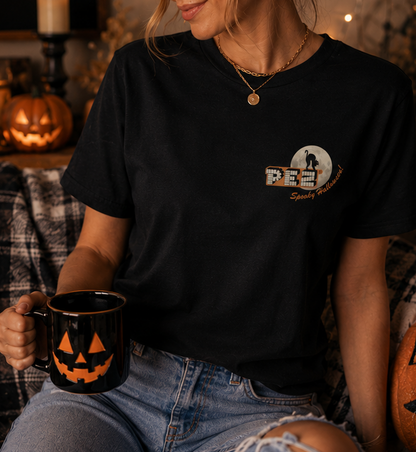 Woman wearing PEZ® Spooky Halloween black T-shirt with vintage black cat and moon left chest graphic