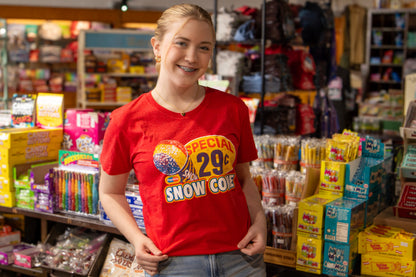 Female model wearing the Popsicle® Vintage Snow Cone Tee in heather red, showcasing a colorful retro Snow Cone design with nostalgic Popsicle artwork and vintage summer-inspired graphics.