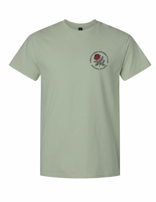 Saint Rita of Cascia "There Is Nothing Impossible to God" unisex graphic T-shirt featuring a red rose chest design on a sage green tee.
