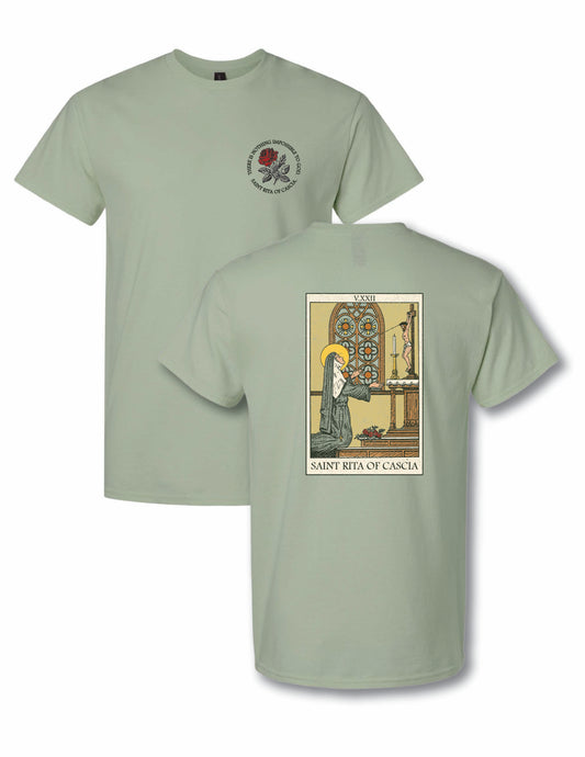 Front and back view of the Saint Rita of Cascia "There Is Nothing Impossible to God" unisex graphic T-shirt featuring a red rose chest graphic on the front and vintage-inspired Saint Rita devotional artwork on the back.