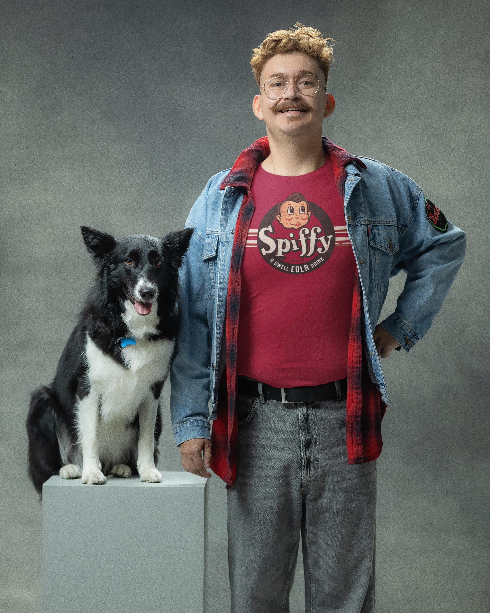 Man wearing the Spiffy® Cola Tee featuring a retro Spiffy Cola logo on a soft vintage-inspired unisex graphic t-shirt.
