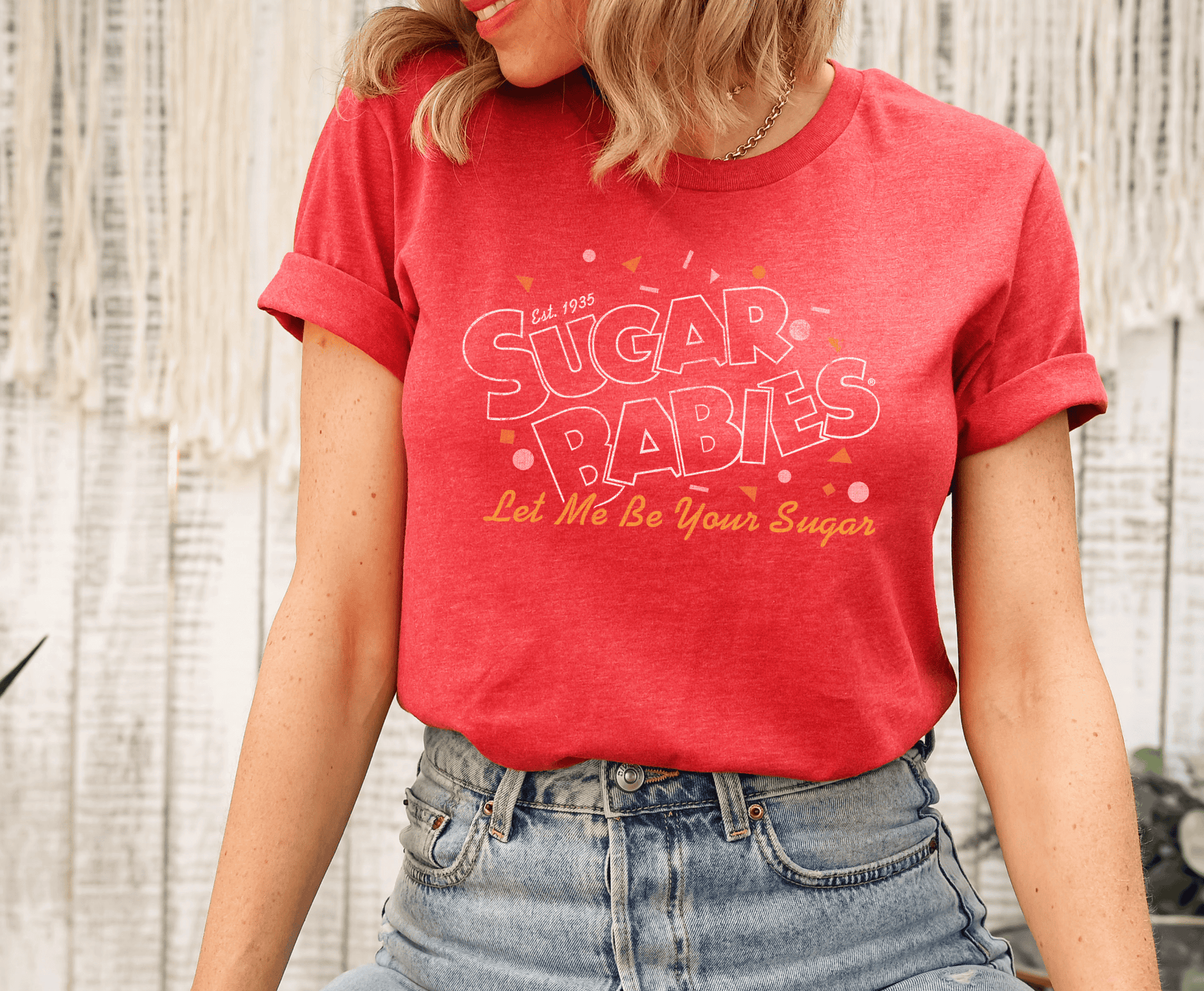 Sugar Babies Let Me Be Your Sugar! unisex graphic tee featuring vintage candy logo artwork styled casually