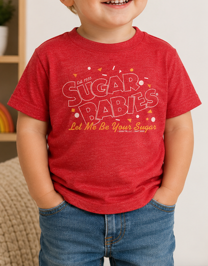 Toddler wearing the Sugar Babies® Let Me Be Your Sugar! graphic T-shirt featuring a nostalgic vintage candy design