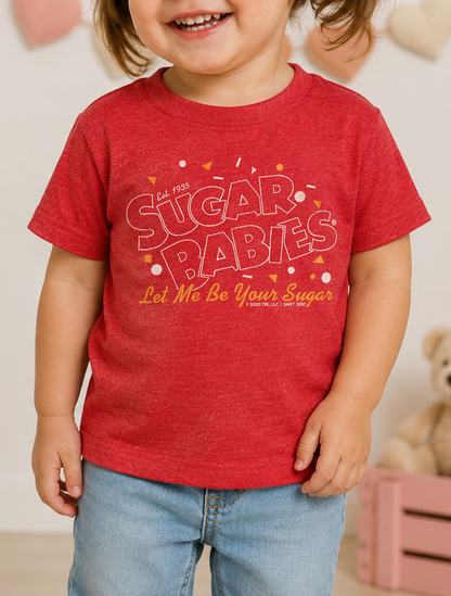 Toddler wearing the Sugar Babies® Let Me Be Your Sugar! graphic T-shirt featuring a nostalgic vintage candy design