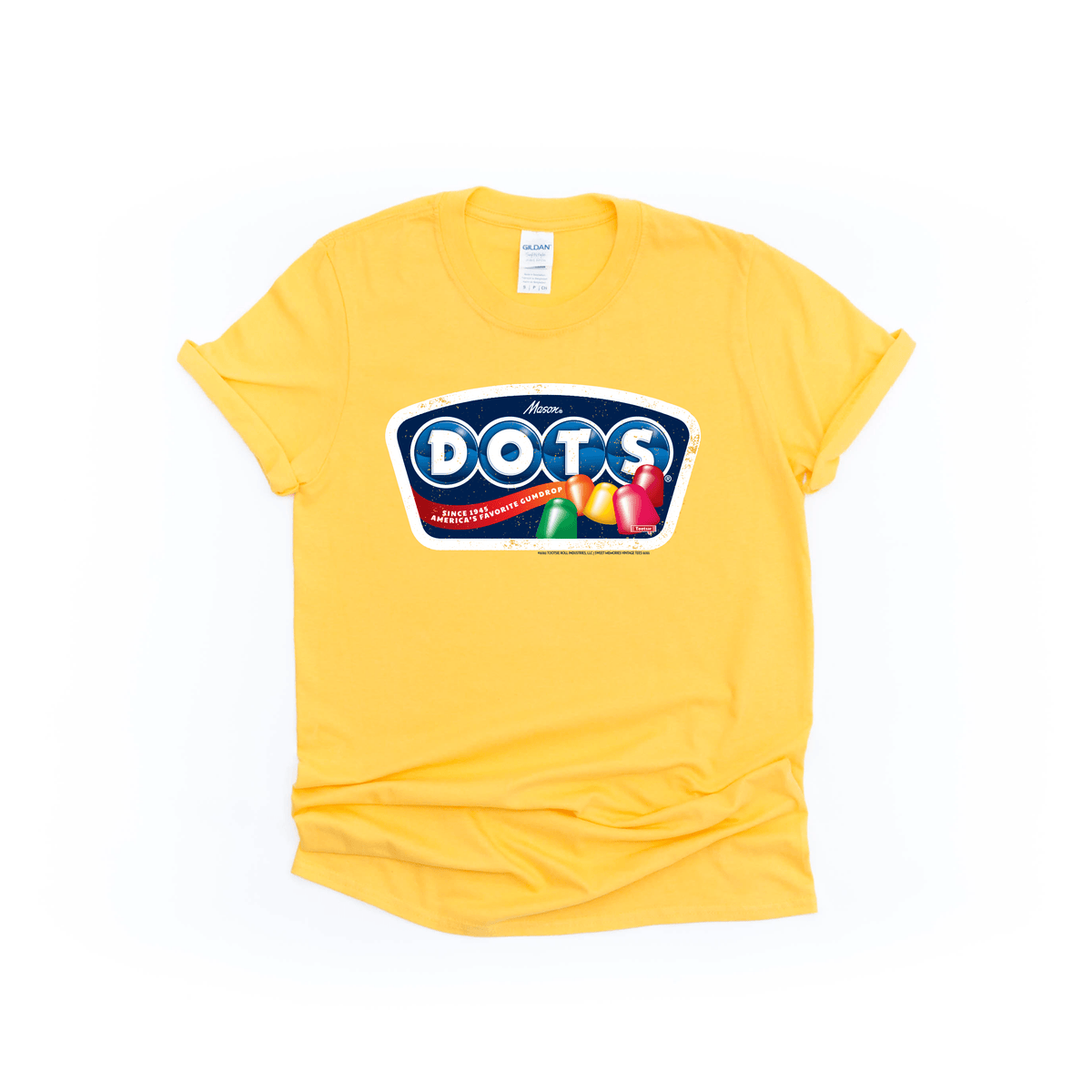 Flat lay of DOTS® Retro Gumdrops Unisex Graphic T-Shirt featuring colorful vintage-inspired DOTS candy logo artwork and nostalgic retro gumdrop design.