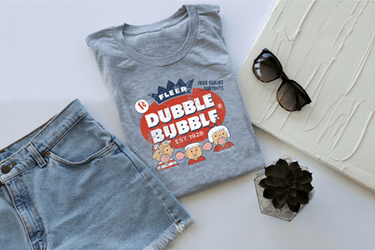 close up of dubble bubble fleer free comics and fortunes vintage bubble gum graphic on soft cotton t shirt