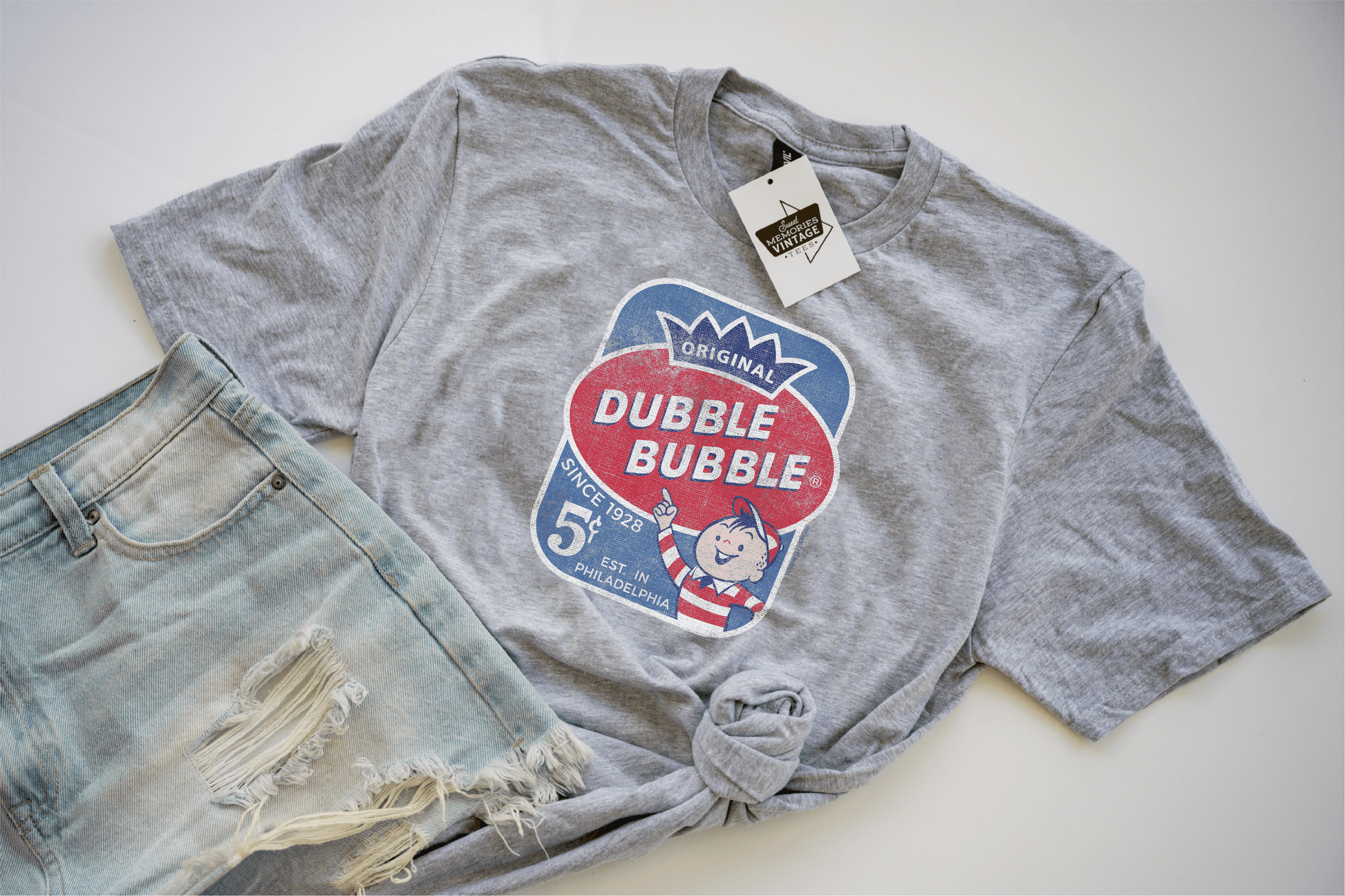 close up of dubble bubble original bubble gum vintage logo graphic on soft cotton t shirt