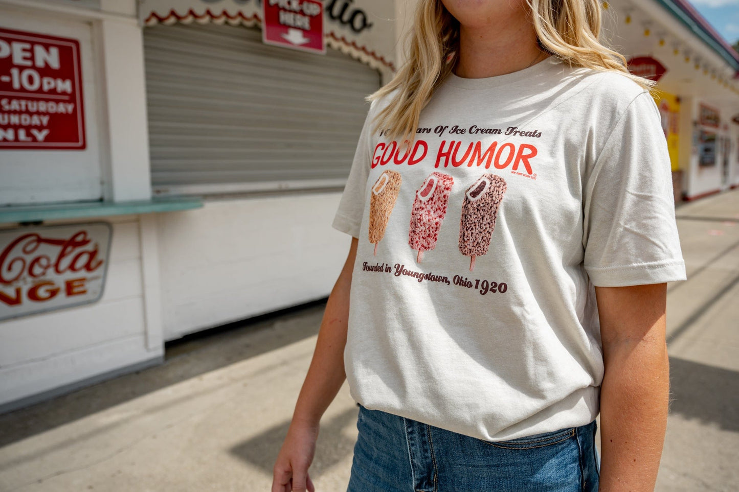 Woman wearing a Good Humor™ What's Your Humor? Vintage Funny Ice Cream Shirt featuring nostalgic ice cream-themed artwork and retro branding.