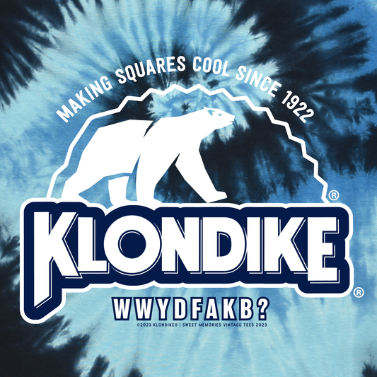 Klondike® Making Squares Cool Since 1922 graphic featuring the iconic polar bear logo above bold Klondike lettering on a blue and navy spiral tie-dye background with the slogan "WWYDFAKB?" and vintage distressed styling.