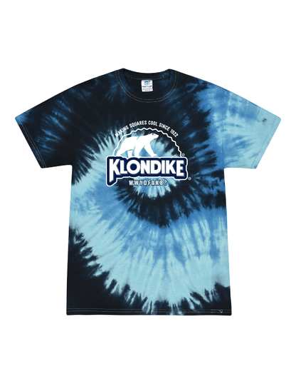 Klondike® Making Squares Cool Since 1922 Unisex Graphic Tie-Dye Tee featuring the iconic polar bear logo on a blue and navy spiral tie-dye shirt inspired by the classic Klondike Bar brand.