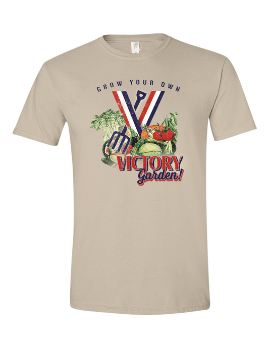 Vintage Grow Your Own Victory Garden Vintage Sand Unisex Tee featuring a retro World War II-inspired victory garden graphic printed on a sand-colored unisex T-shirt.